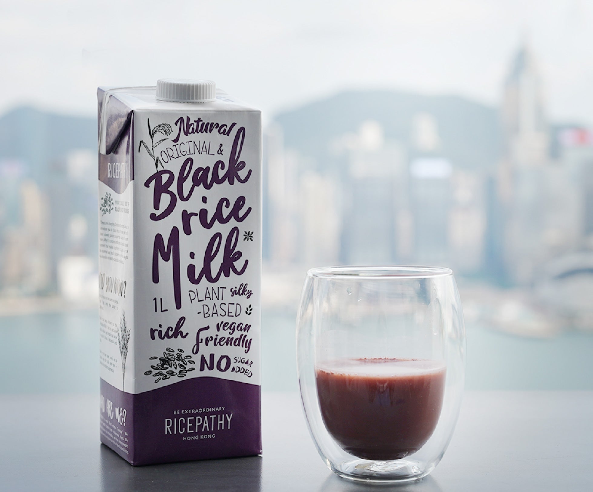 RICEPATHY black rice milk with Hong Kong harbour sea background